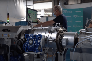A Bausano Employee demonstrate an extrusion line